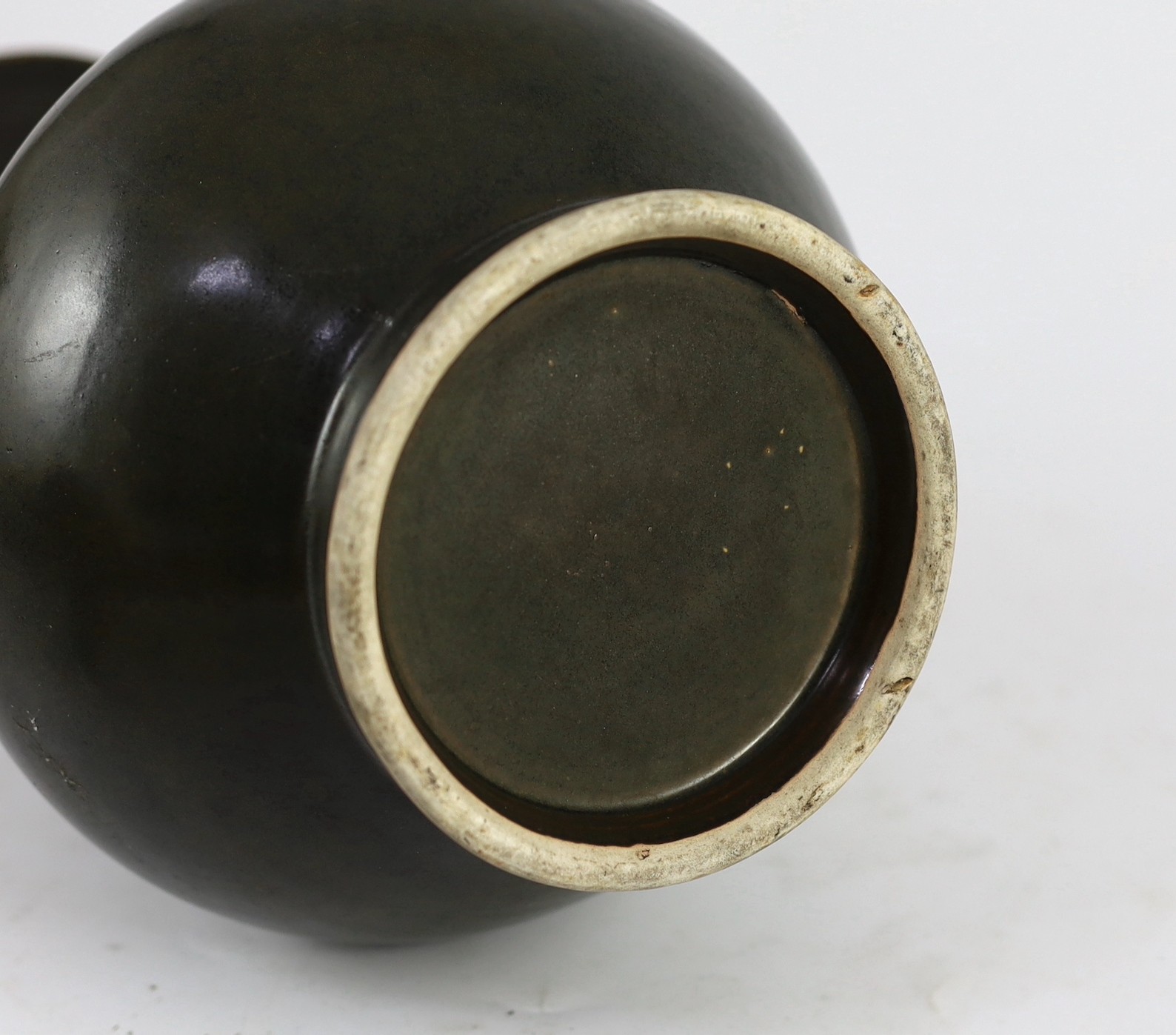 A Chinese Jian style brown glazed vase, hu, 18th/19th century, 31.5cm high, cracked, wood stand